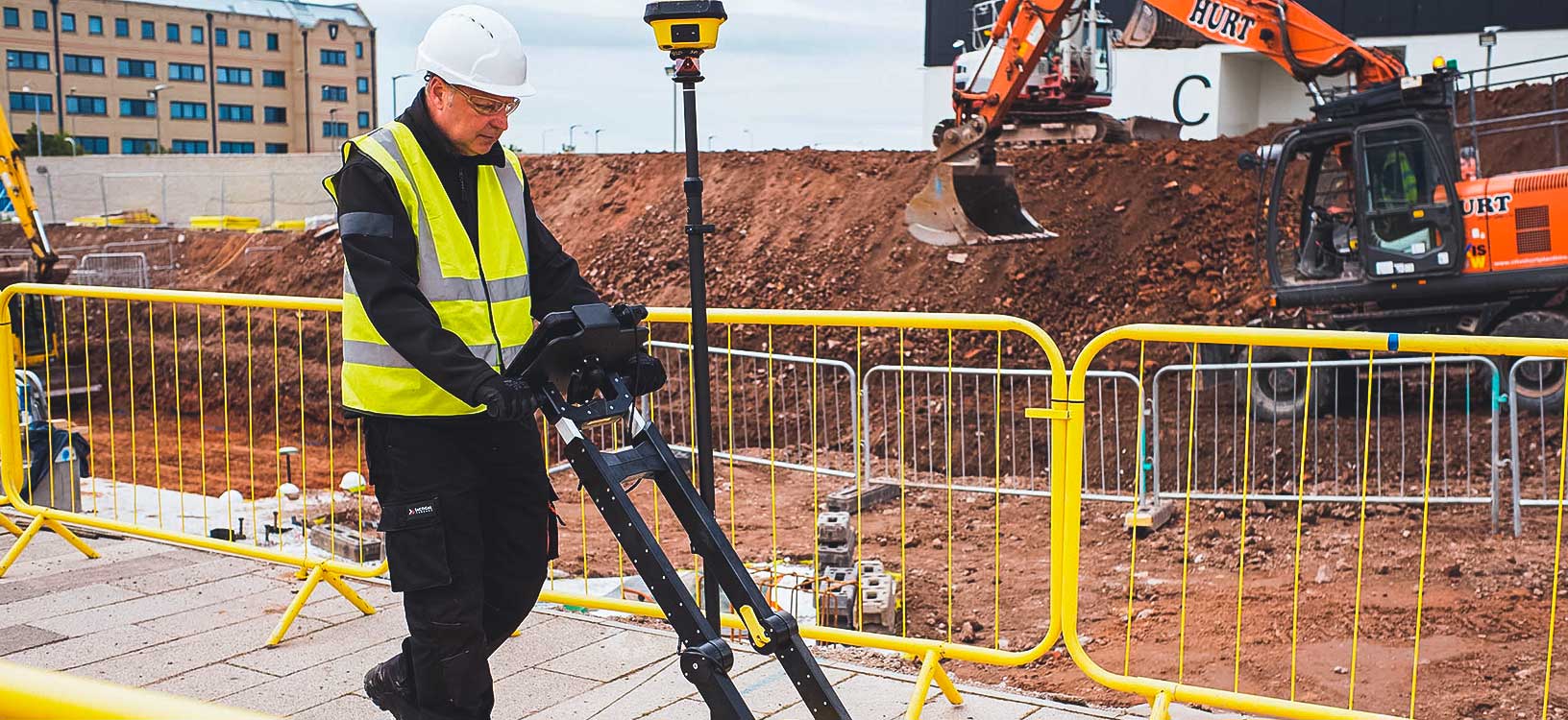utility surveyor on a construction site capturing underground information with the Leica DSX