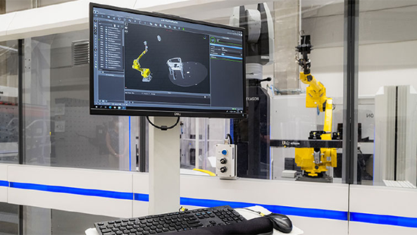 Hexagon's robotic automation demonstrating software and tracker at Skoda manufacturing plant
